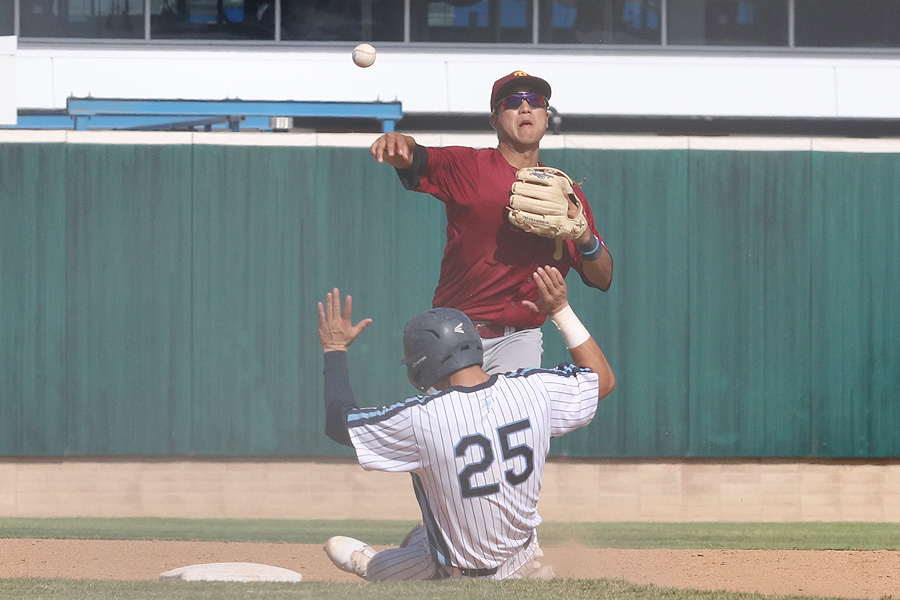 PCC second baseman Andres Kim makes the turn at second during PCC's loss at El Camino College Friday, photo by Richard Quinton.