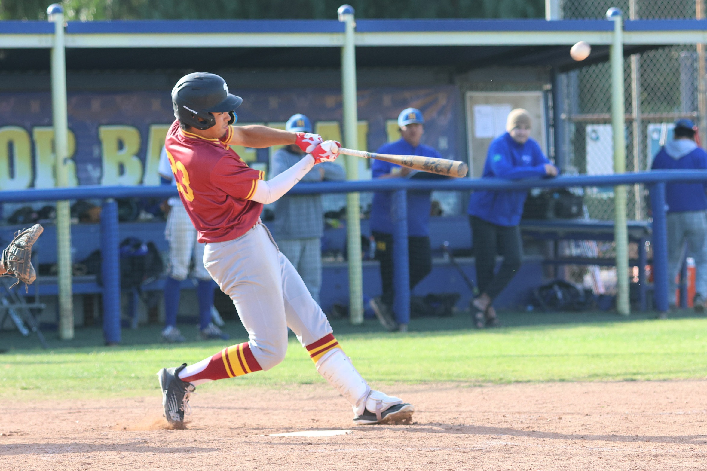 Toshiki Kuriya with one of the longest home runs of the season in PCC's win at LA Harbor (photo by Richard Quinton).