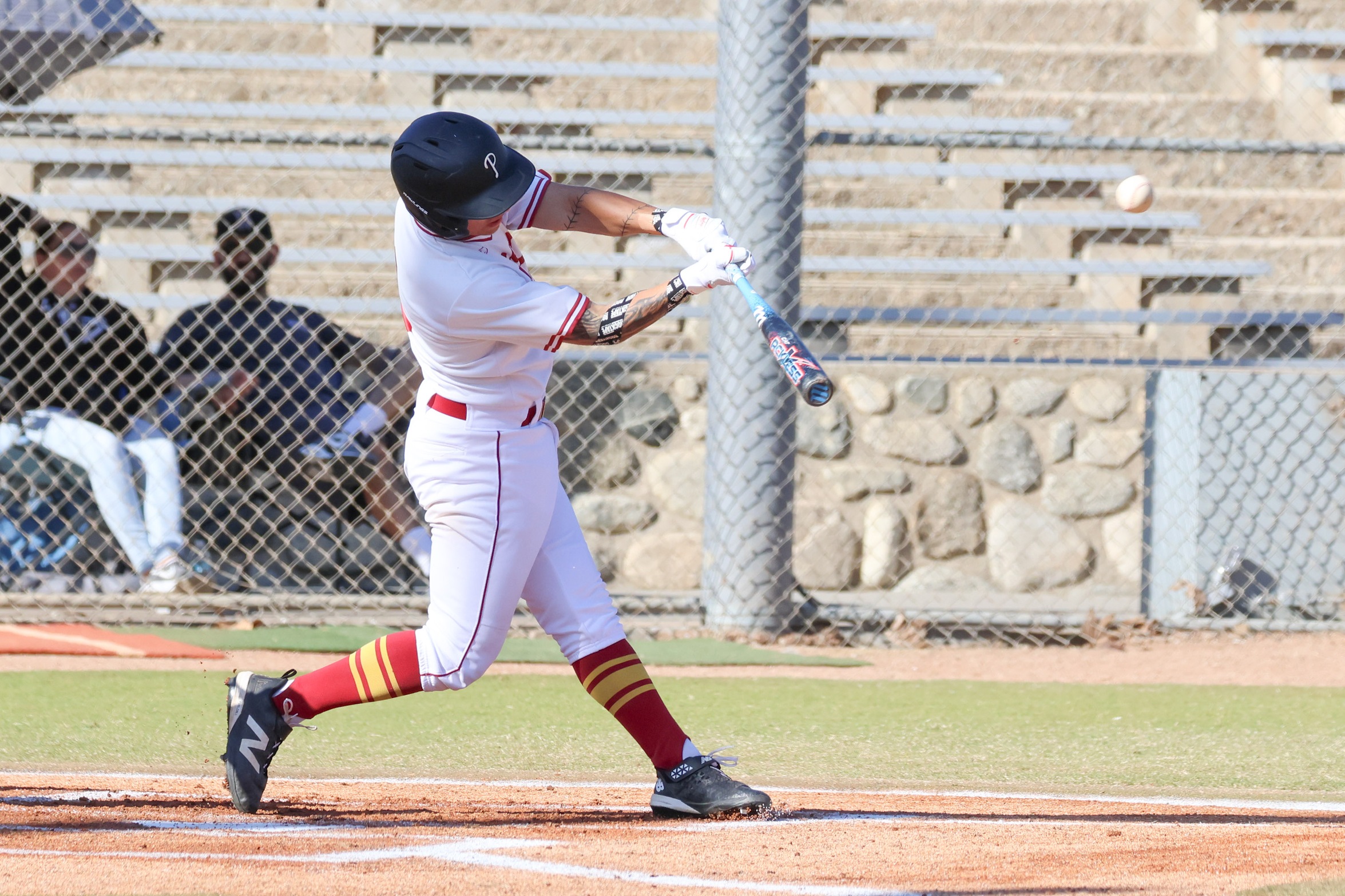 Luke Bauer delivers a hit during PCC's win on Tuesday (photo by Richard Quinton).