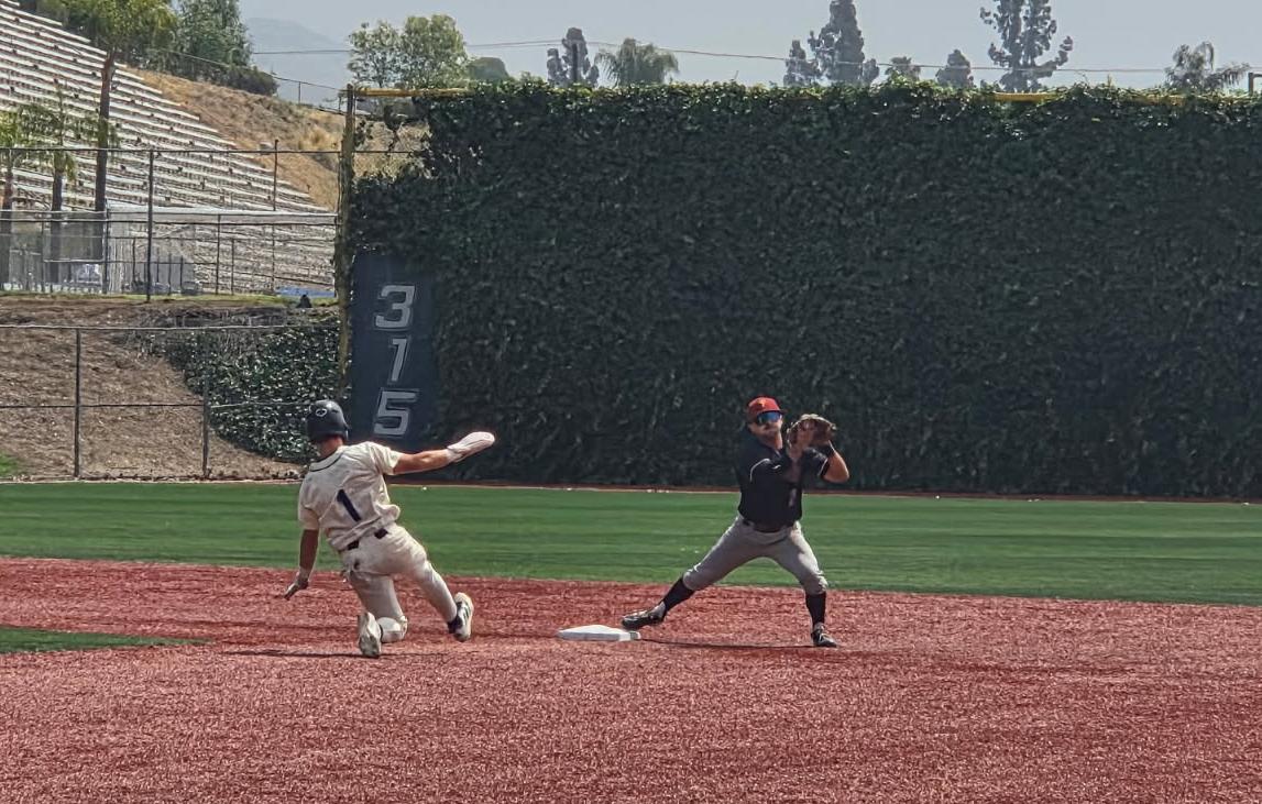 Omar Cisneros with the fielder's choice putout v. Cypress in the Regionals at Citrus College.