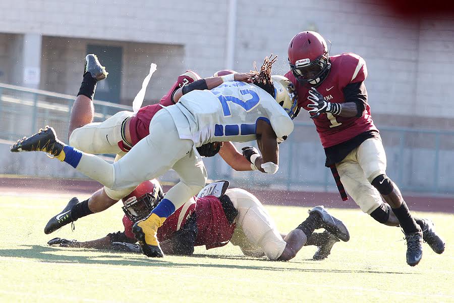 Big Catches Key Football's Rally Over Hancock, 21-17