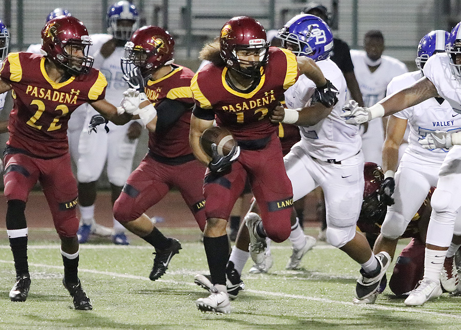 Lancer wide receiver Drew Pendleton with the ball during PCC's loss to San Bernardino Valley Saturday evening, photo by Richard Quinton.
