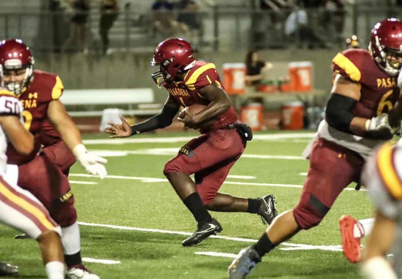 No one could stop Lancer QB Edward Norton as he accounted for four touchdowns and a 2-point conversion in PCC's win Saturday night, photo by Michael Watkins.