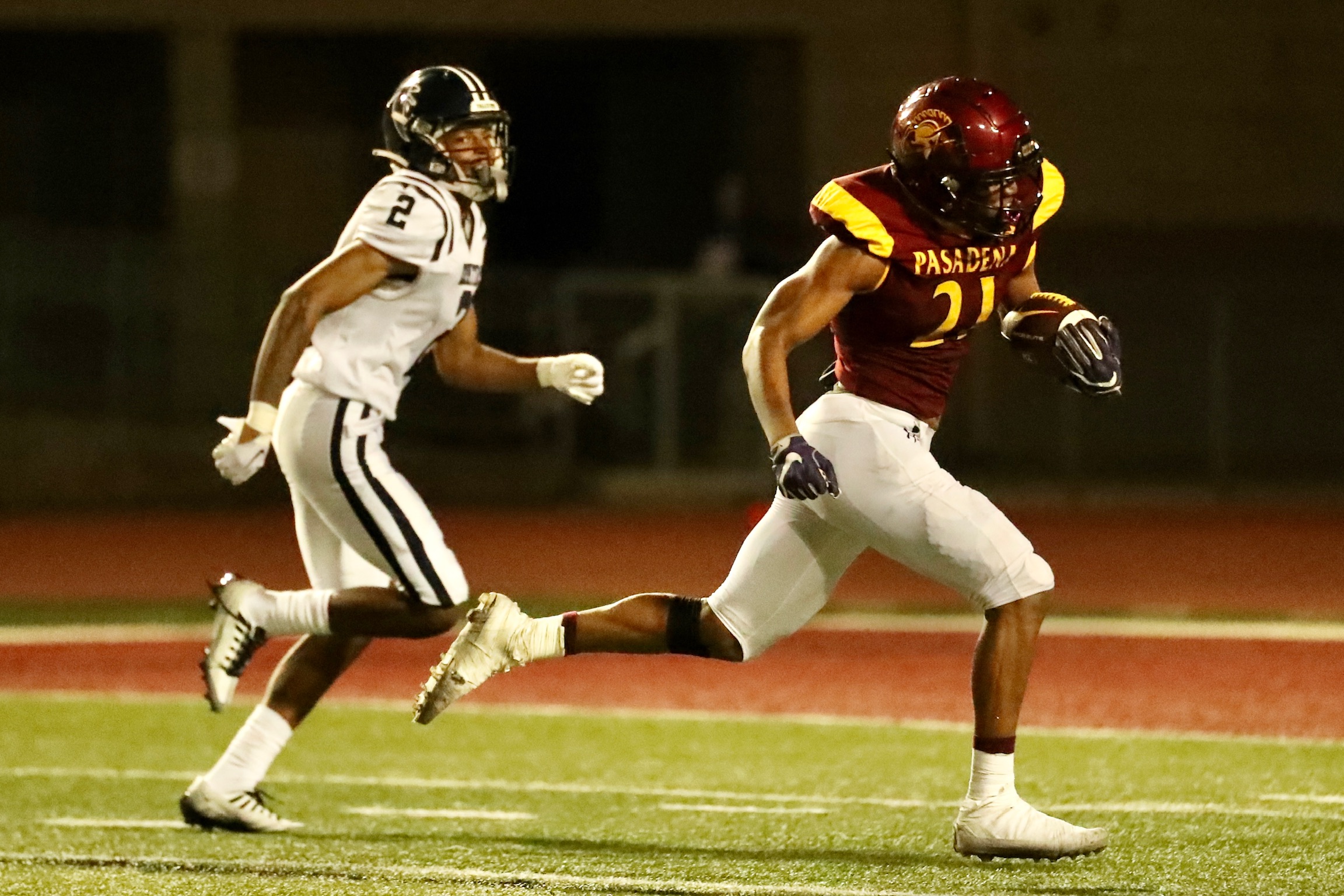 PCC receiver Jason Sanford breaks loose for a 70-yard TD reception on Saturday night (photo by Michael Watkins).