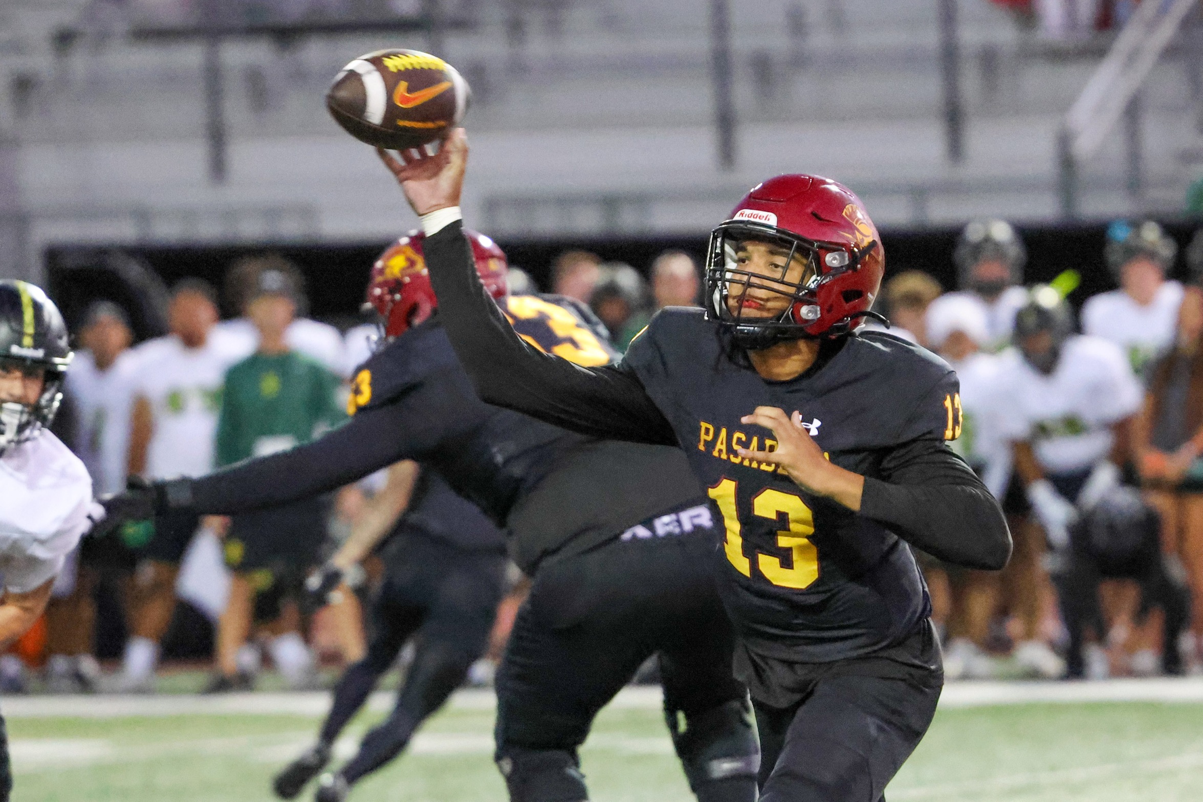 Xavier Buckles with the pass during PCC's loss to Golden West on Thursday night (photo/gallery by Richard Quinton).