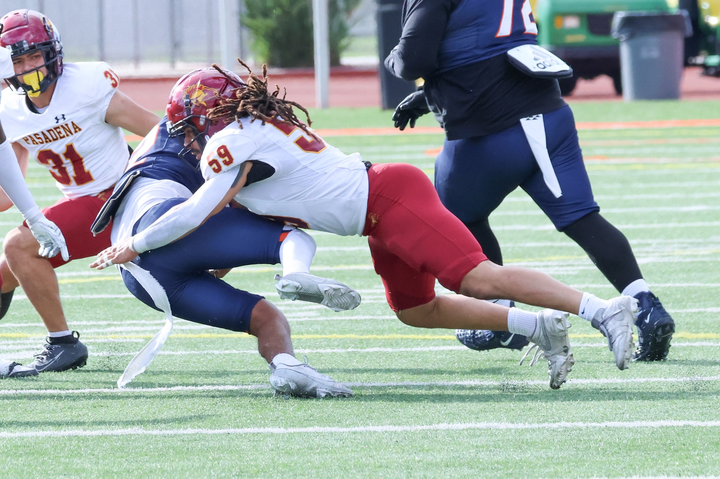 Devon Jones makes the tackle during PCC's Golden State Bowl victory (photo/gallery by Richard Quinton).