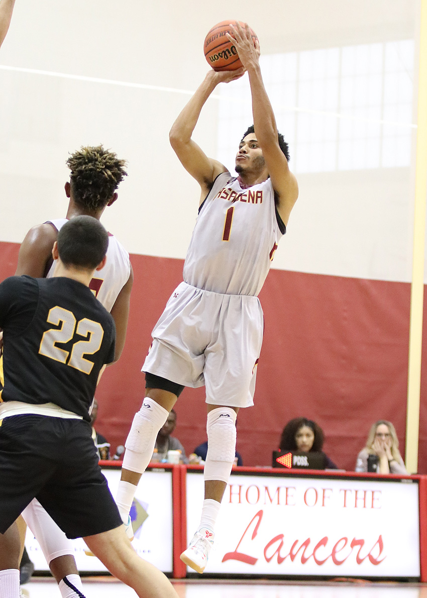 All-Tourney Lancer Josiah Woods takes a jumper during PCC's loss to LA Trade Tech Saturday at the 2nd Skip Robinson Classic, photo by Richard Quinton.