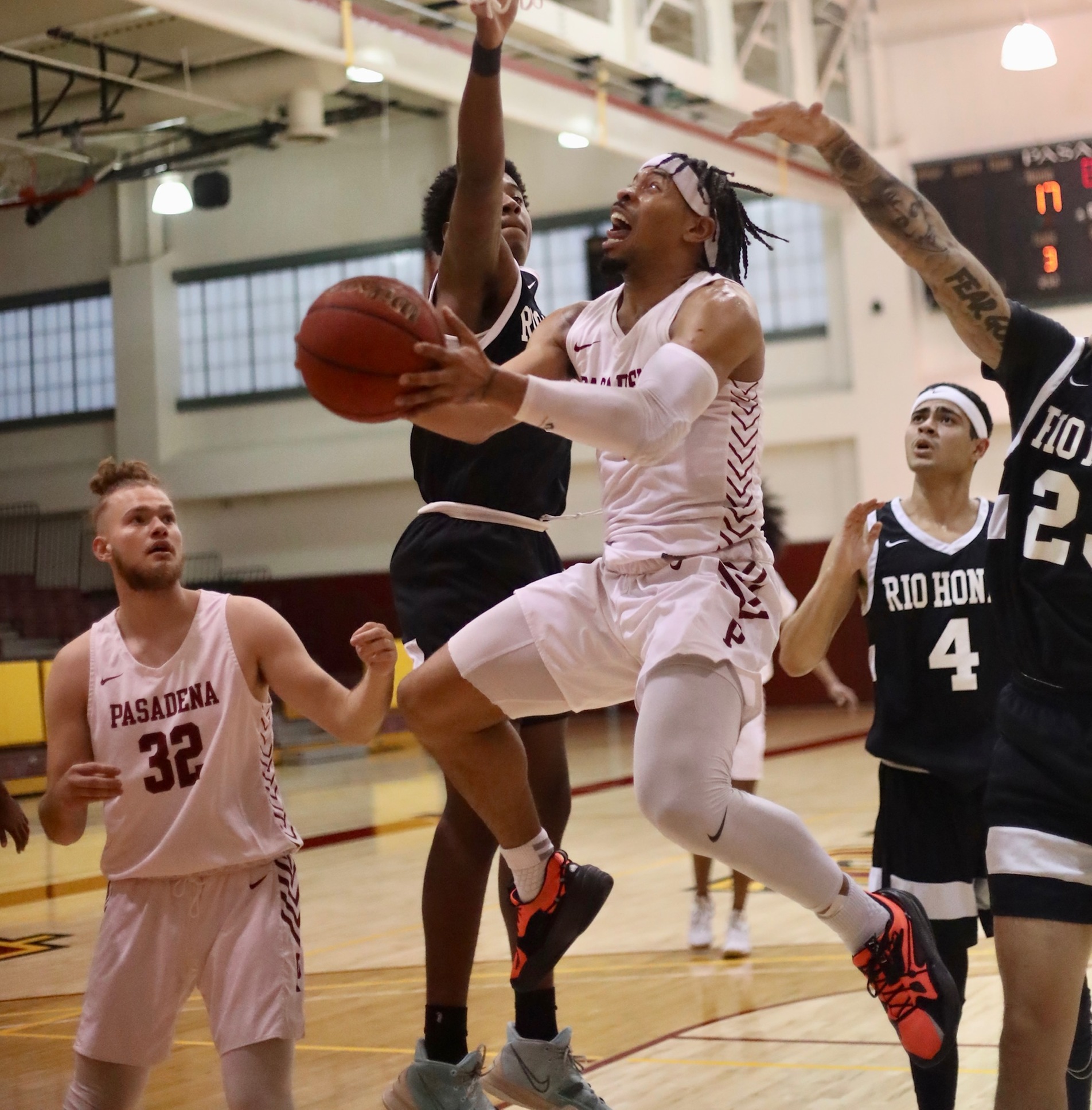 Devan Ford drives to the hoop during PCC's loss to Rio Hondo Friday night (photo by Michael Watkins, Athletics).
