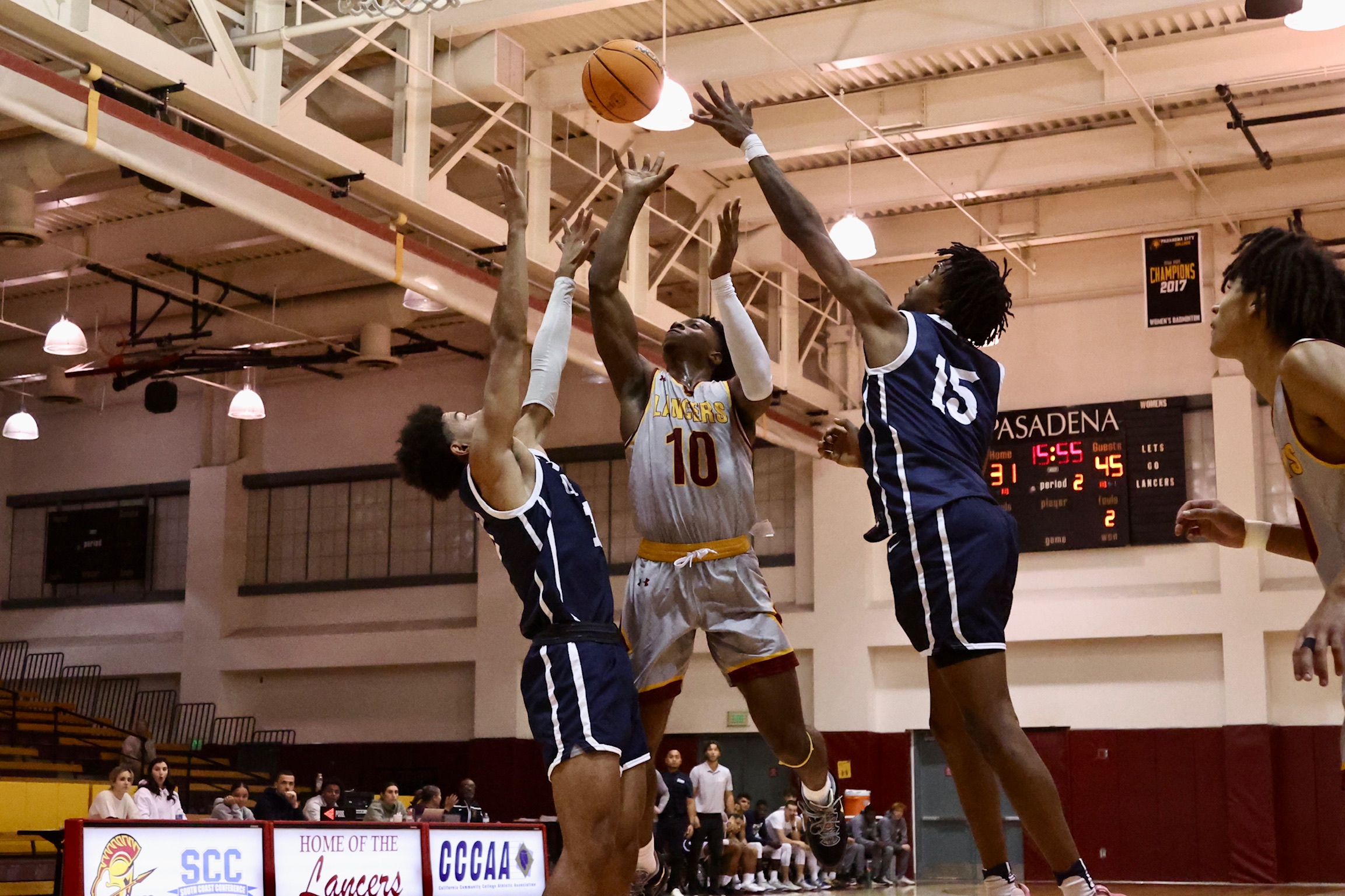 Jonathan Tchengang goes up for a shot during PCC's home opener on Saturday (photo by Michael Watkins).
