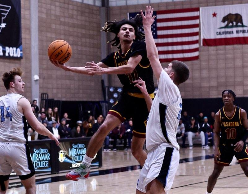 Jayden Winfrey drives the lane during PCC's stunning Round 2 win at San Diego Miramar College on Saturday (photo by Michael Watkins).