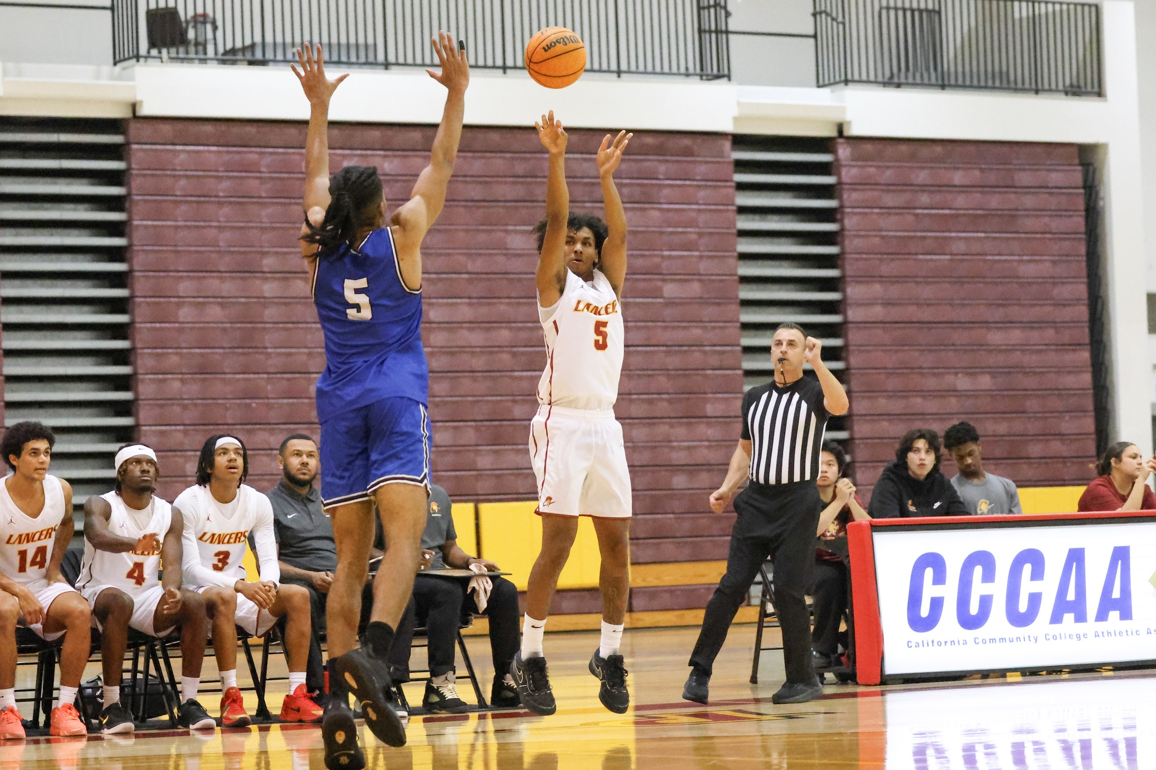 Gor-El Zollicofer fires up 3-pointer during PCC's season-opening win on Tuesday (photo by Richard Quinton).