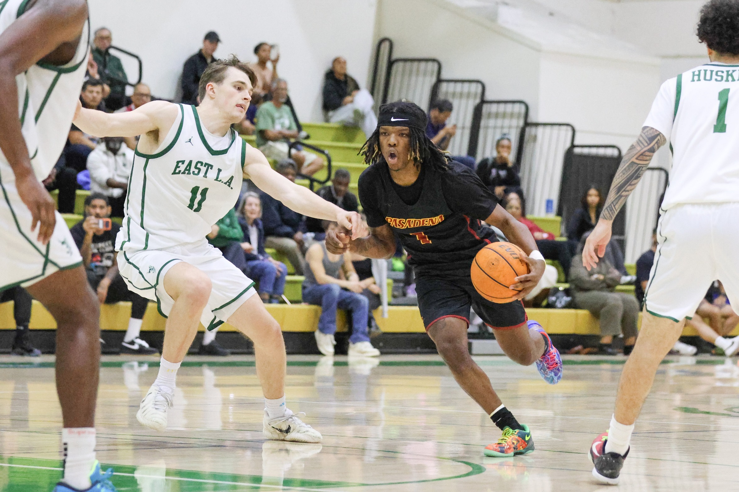 Brandin Jackson drives to the basket in PCC's loss at East Los Angeles College on Friday night (photo by Richard Quinton).