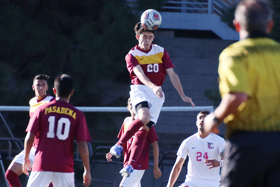 Lancer Joshua Moran heads this ball during Tuesday's game at Robinson Stadium, photo by Richard Quinton.