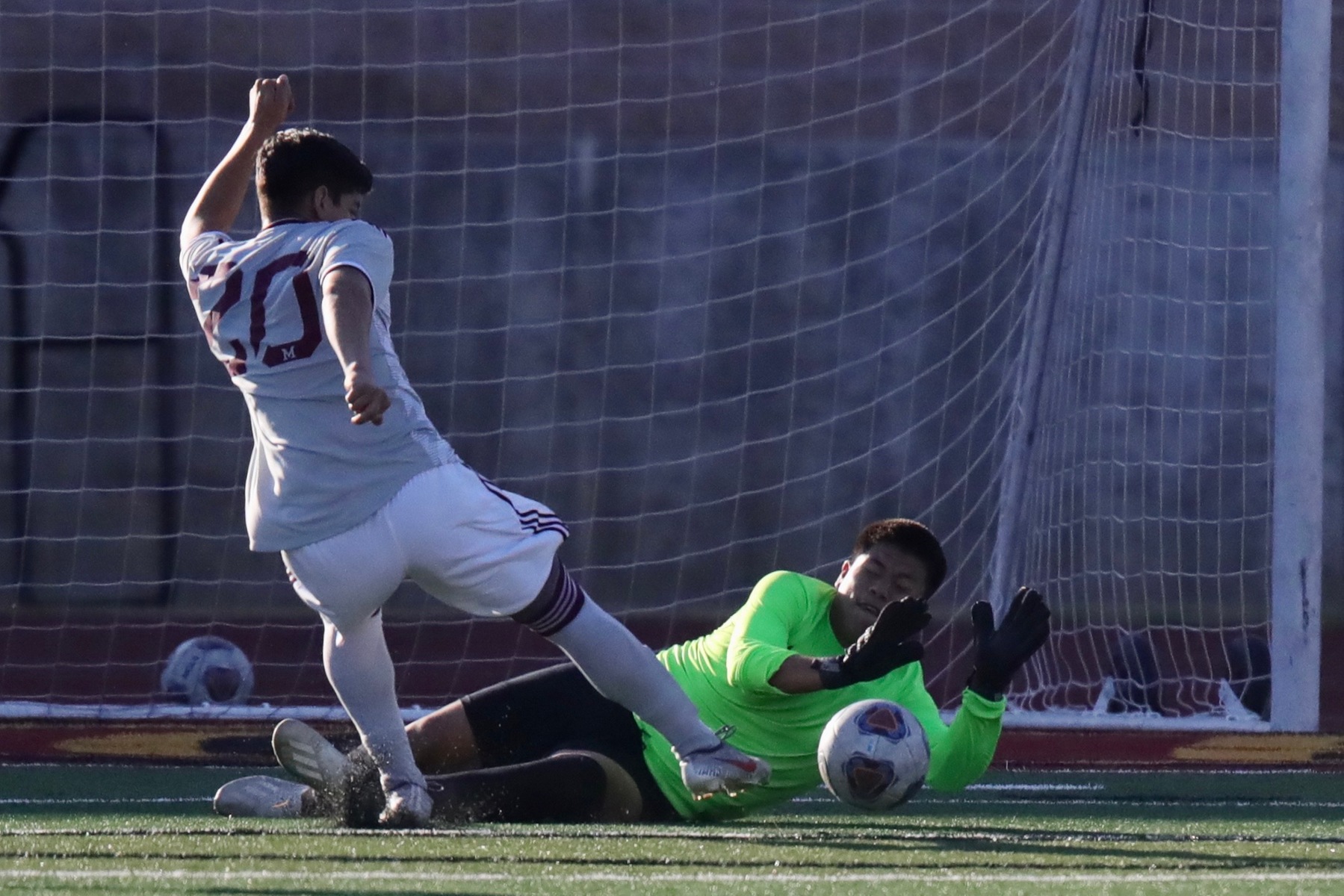 Lancer goalie Steven Sandoval goes down to make a save during PCC's loss to top-rated Mt. San Antonio Tuesday at Robinson Stadium, photo by Michael Watkins.