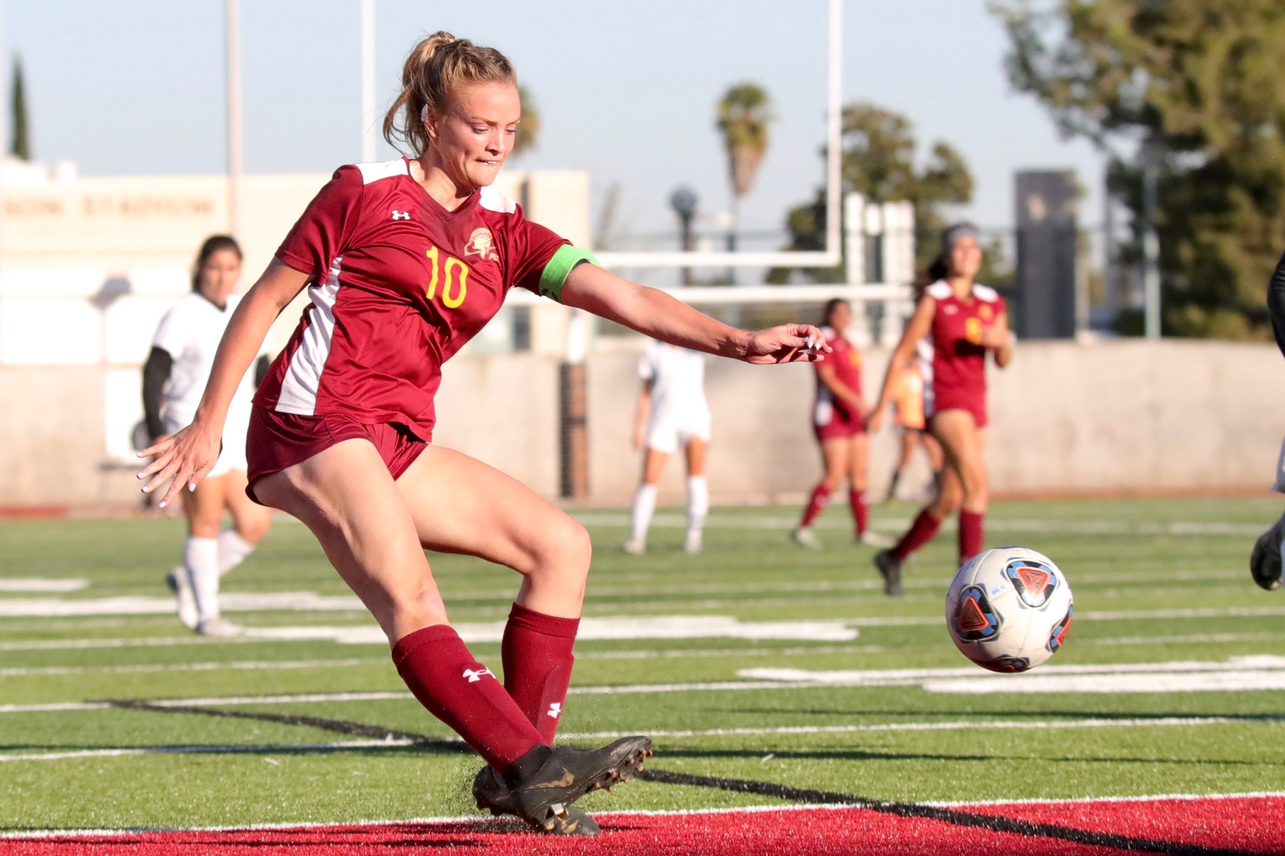 Katy Coats drives a shot during PCC's tie v. East LA on Friday at Robinson Stadium, photo by Michael Watkins.