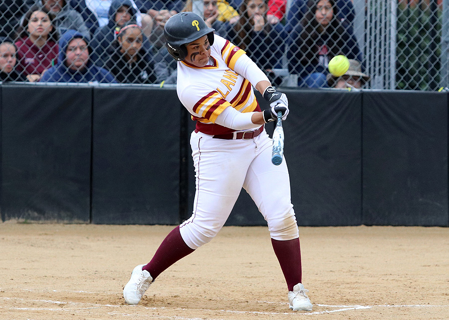 Bree Howard is the team's slugging first baseman. She has three home runs, including this drive v. Santa Barbara on Sunday, photo by Richard Quinton.