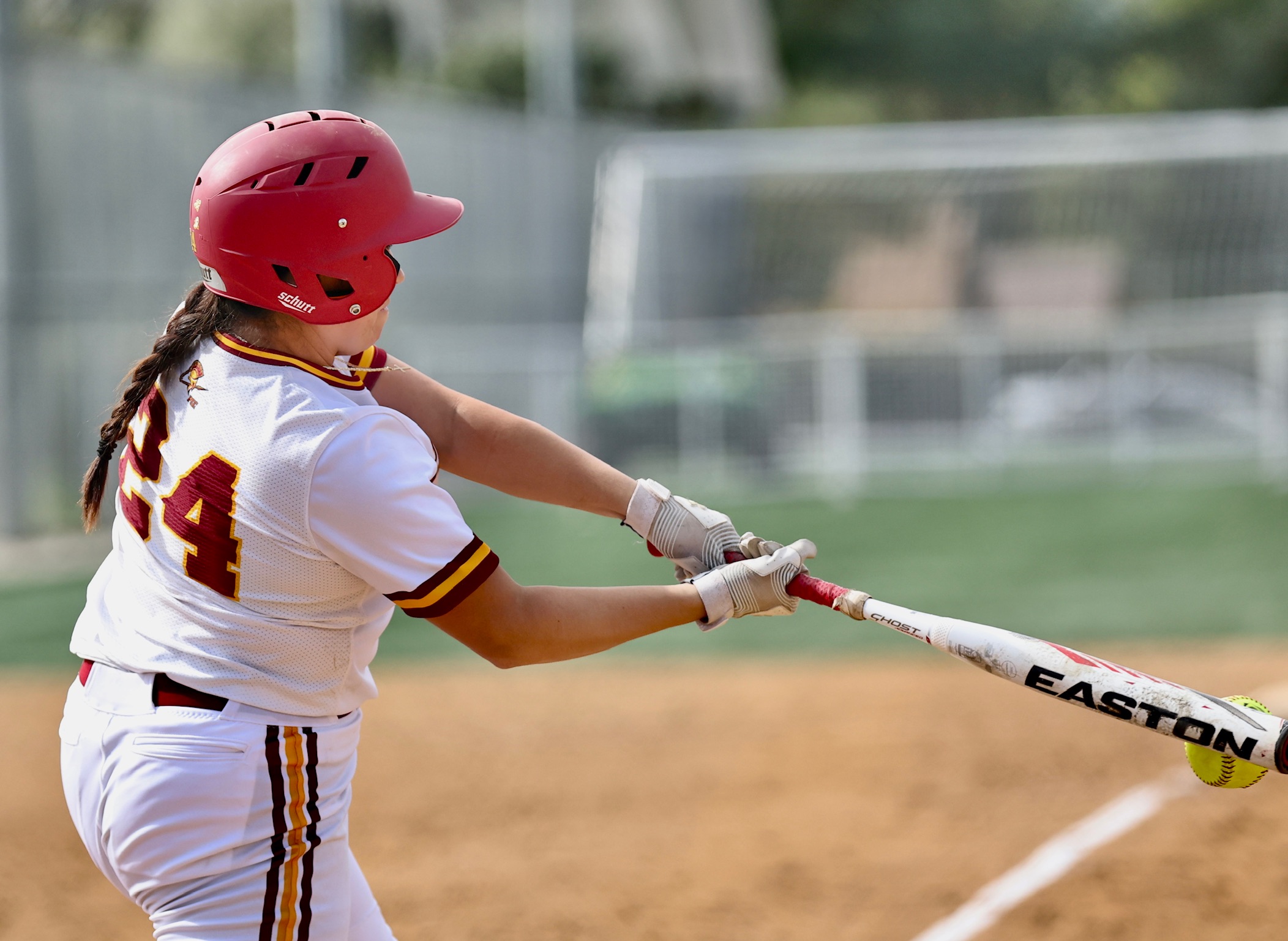Olivia Nanez connects for a hit during PCC's doubleheader Friday at Robinson Park (photo by Michael Watkins).