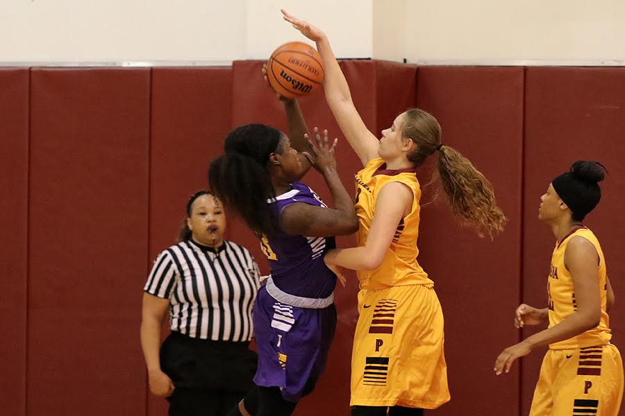 Lancer Alisa Shinn blocks a shot against Trade Tech. PCC made 11 blocks overall at Mt. SAC Friday.