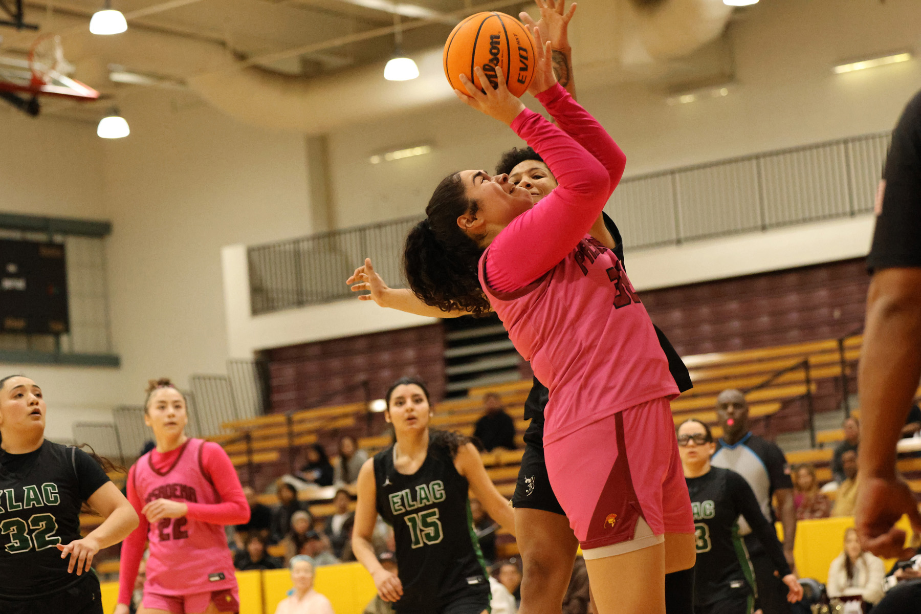 Kimberly Dominguez makes her big basket late in the fourth quarter (photo/gallery by Richard Quinton).