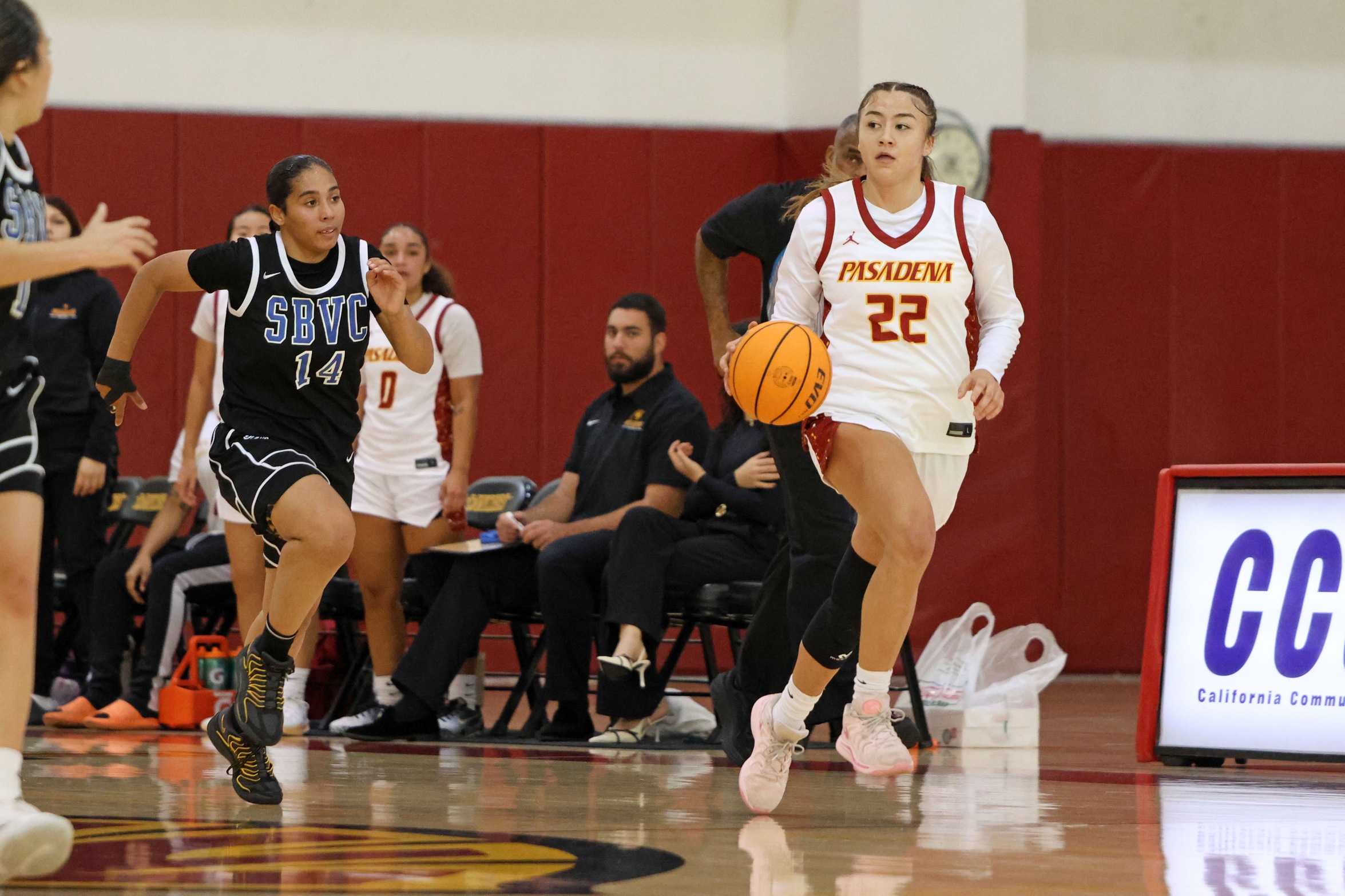 Kamora Fletcher brings the ball upcourt in a recent home game (photo by Richard Quinton).