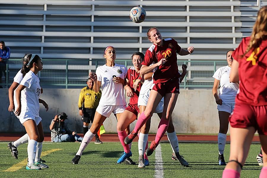 Lancer Summer Hofstad performs a header that went wide of the Rio Hondo goal during PCC's loss at Robinson Stadium Tuesday, photo by Richard Quinton.
