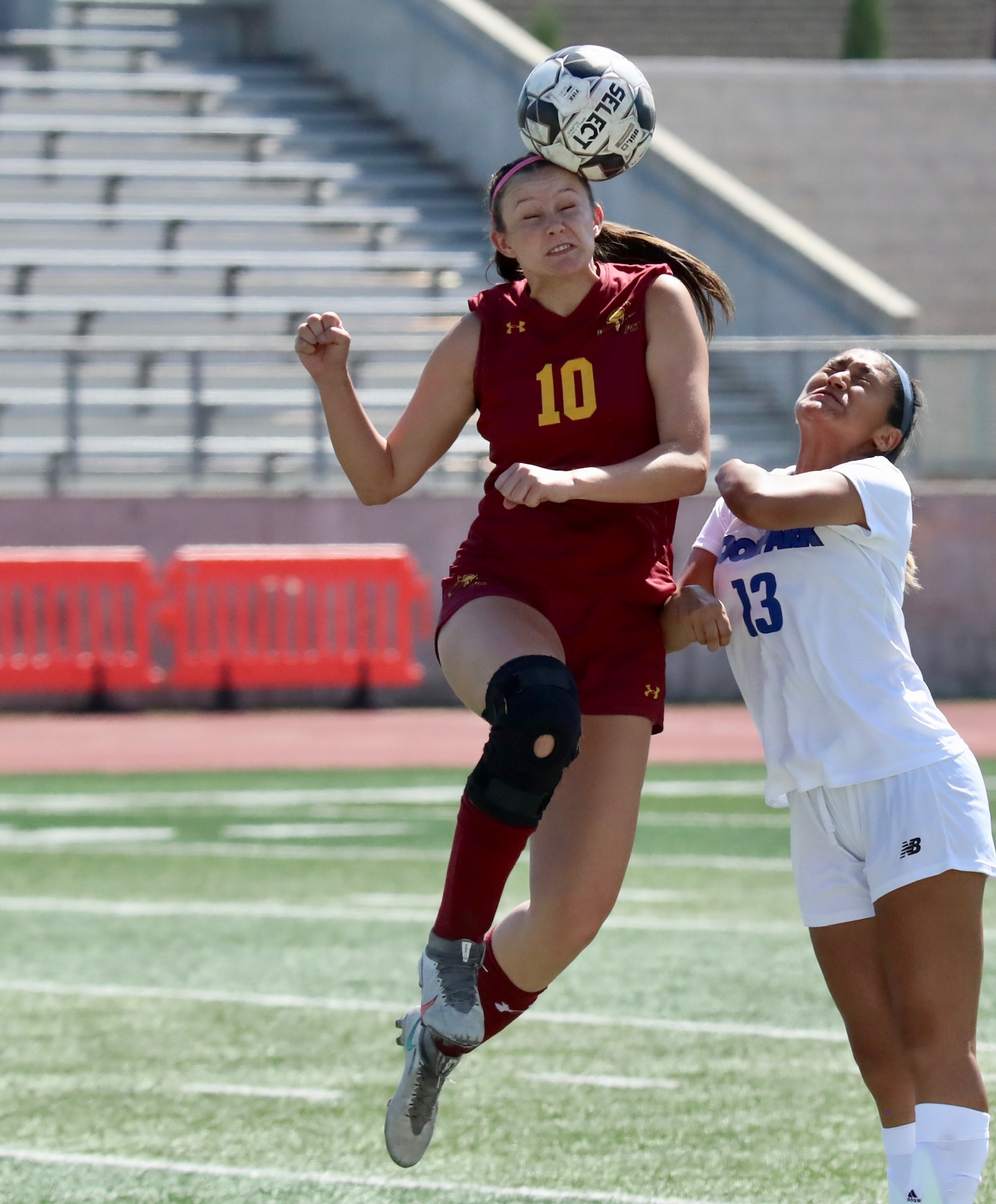 Megan Schmidt heads the ball in a game last week (photo by Michael Watkins).