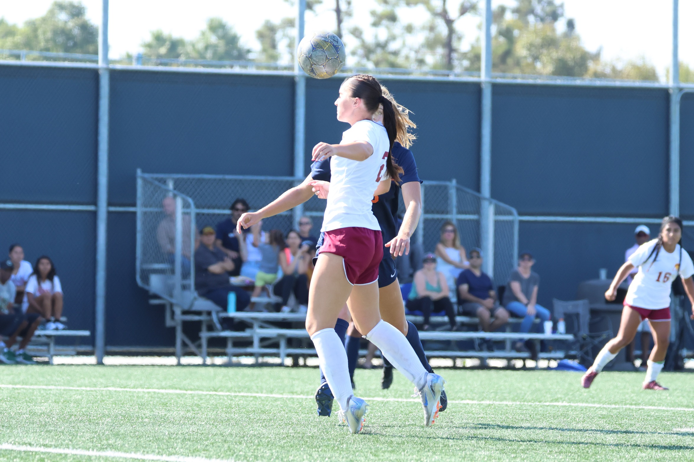Hailey Hull with the header goal for the Lancers on Friday at Orange Coast College (photo by Richard Quinton).