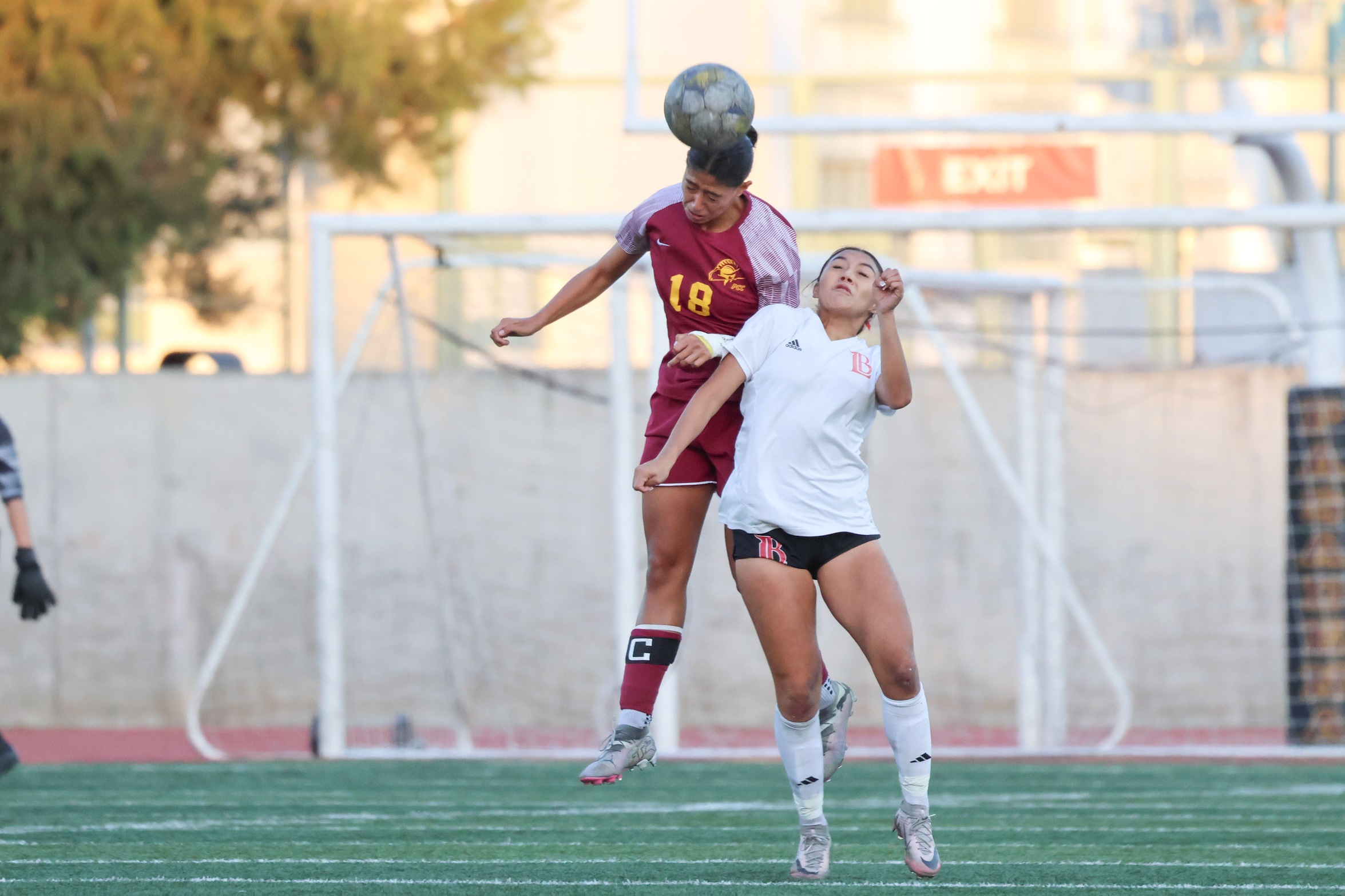 Itzel Nunez with the header defensive play in Tuesday's win (photo by Richard Quinton).