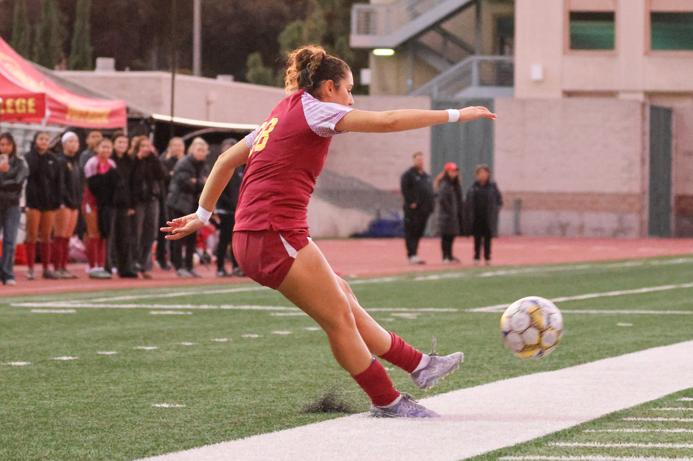 Isabella Nersesyan drives in a goal from the sideline in PCC's playoff win on Wednesday (photo/gallery by Richard Quinton).
