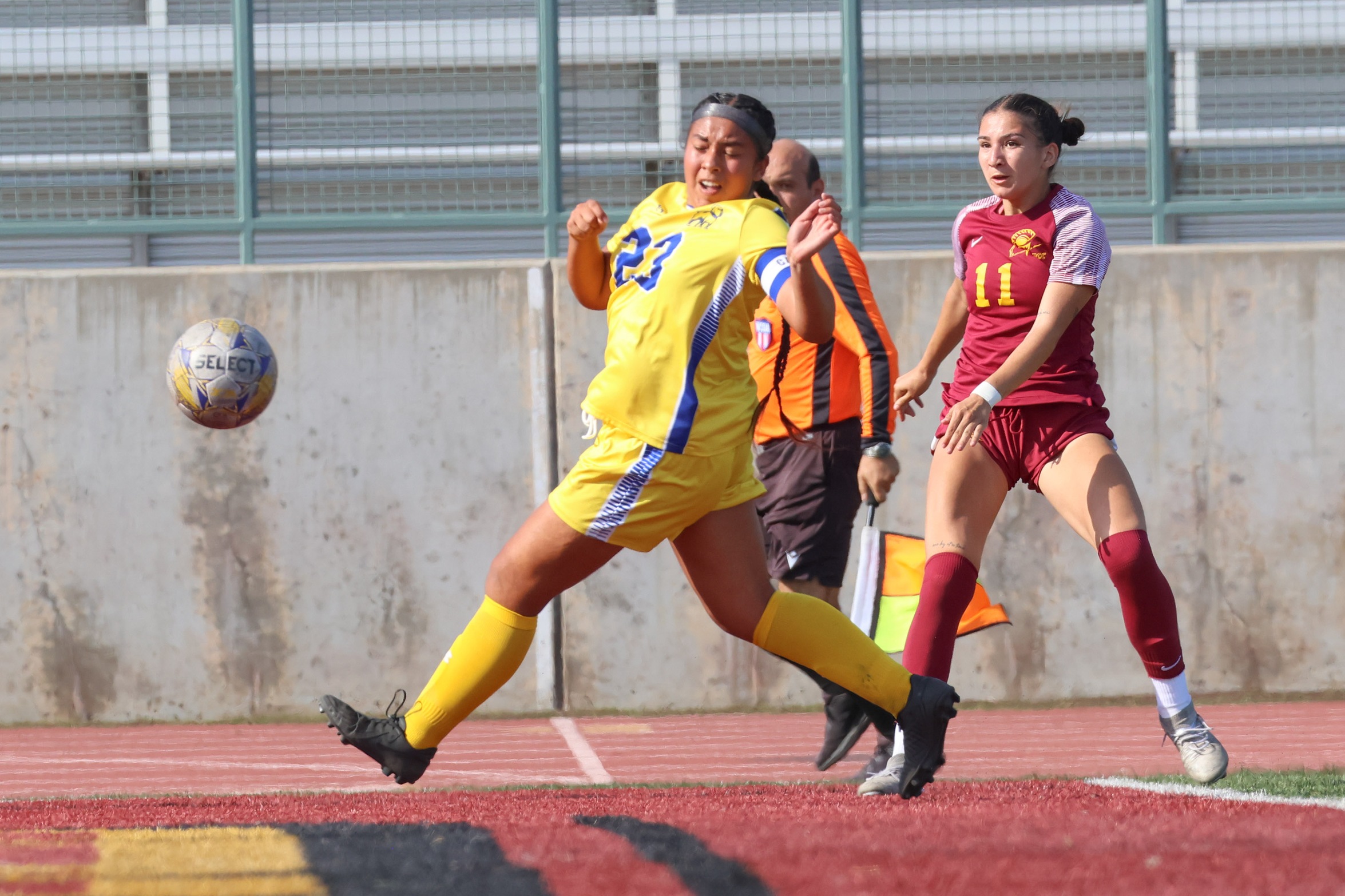 Alexandra Lopez watches her drive go in for a goal in PCC's home-opening victory (photo by Richard Quinton).