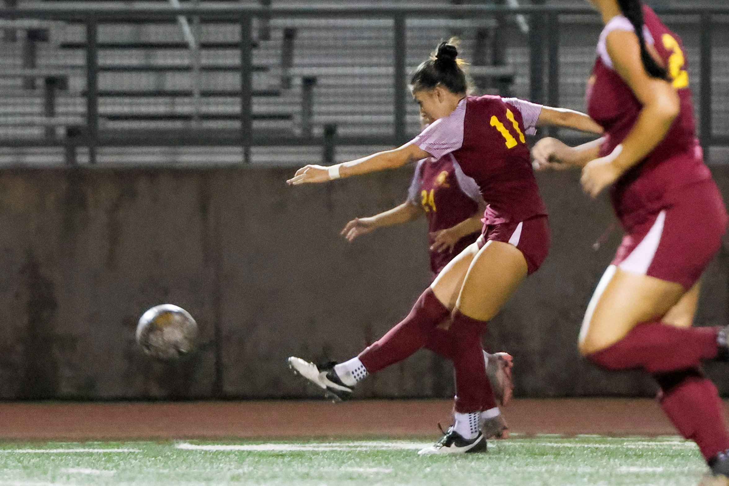 SCC leading scorer Alexandra Lopez scores here during PCC's win on Friday night (photo by Richard Quinton).