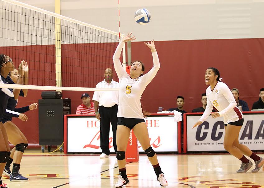 Lancers setter Emily Leung in action during PCC's loss to El Camino Friday at Hutto-Patterson Gymnasium, photo by Richard Quinton.