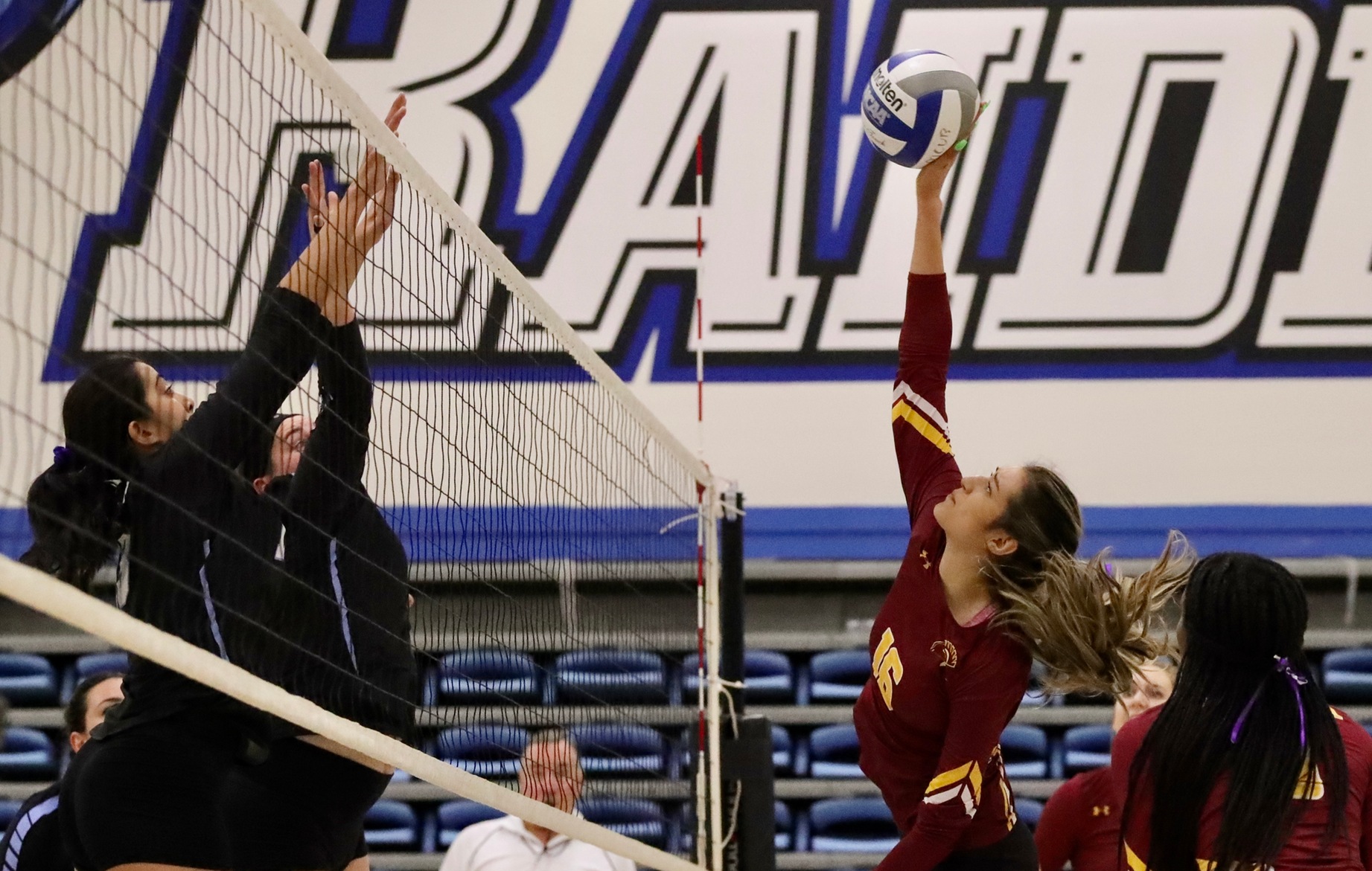 Lancer Paulina Lopez connects on this ball during PCC's playoff loss at Moorpark College Tuesday night, photo by Michael Watkins.