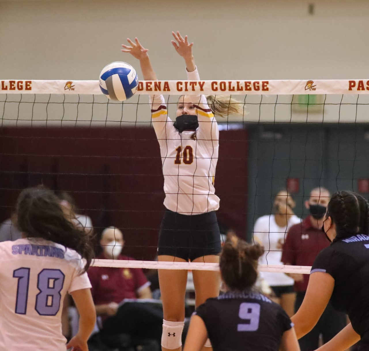 Lancers freshman Bia Silva goes up for the block during PCC's season-opening win over MiraCosta (photo by Michael Watkins).