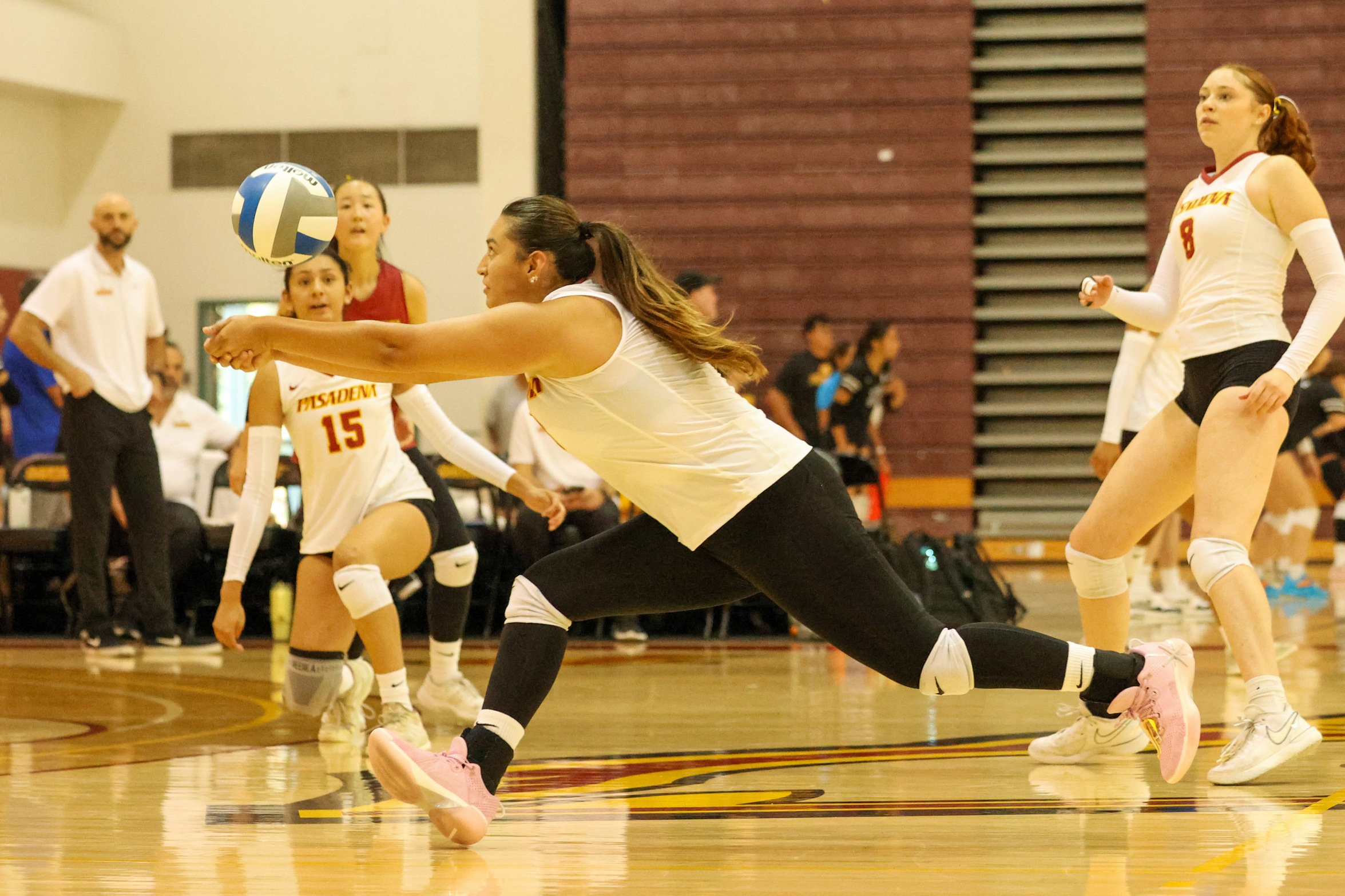 Melissa Monterroza makes the dig during Friday's action (photo by Richard Quinton).
